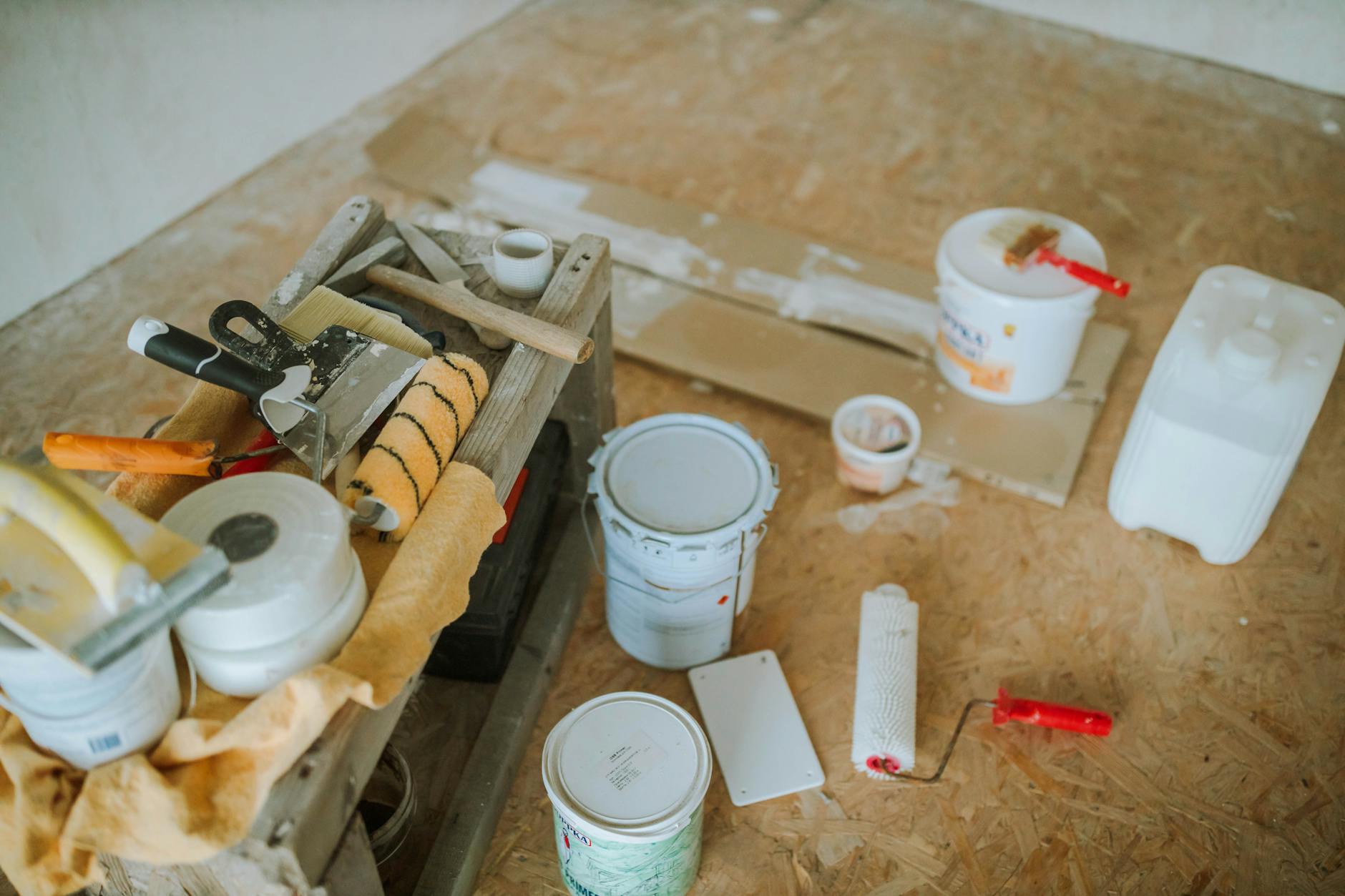 Small DIY home upgrade ideas sketched with materials and tools